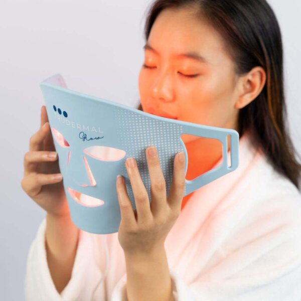 woman about to put mask on